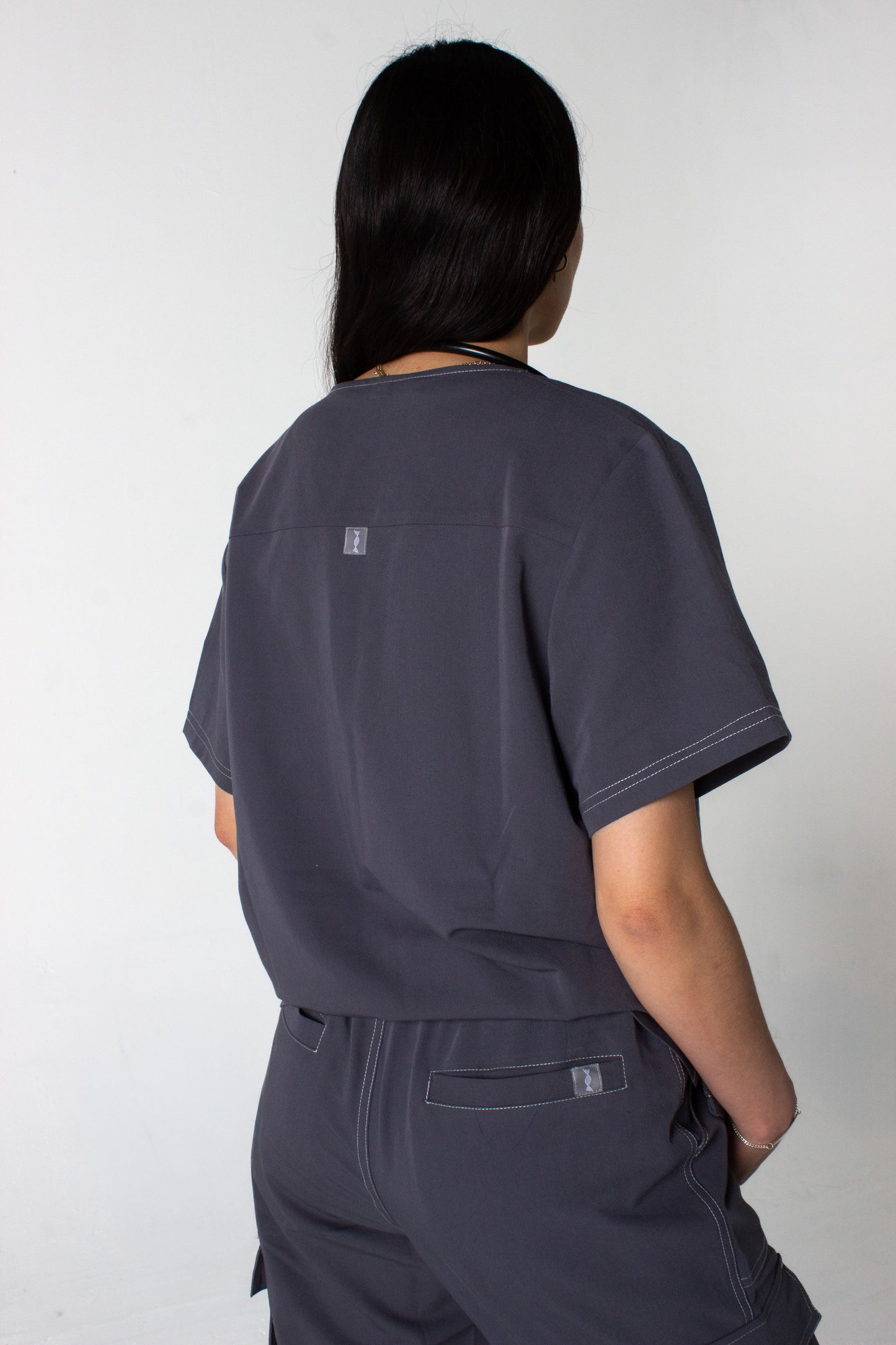 The Outline Scrub Top